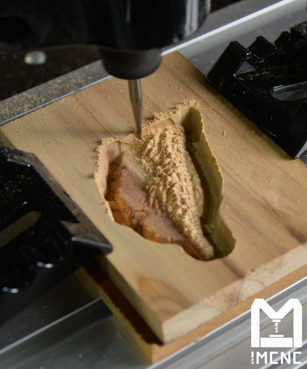 IMCNC BE2216 CNC machine carving wood using ER11 CNC bit, showcasing durability, precision, and clean cutting for woodworking applications.