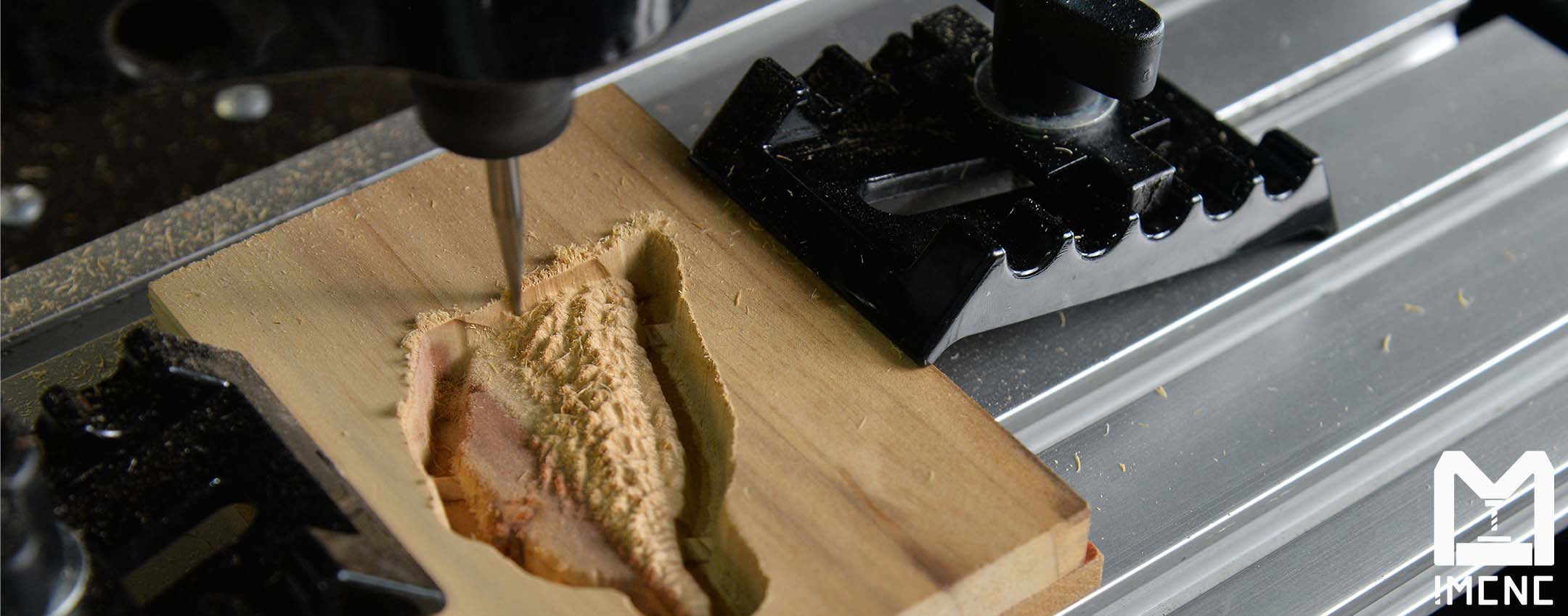 IMCNC BE2216 CNC machine carving wood with ER11 CNC bit, durability performance and clean cutting performance.