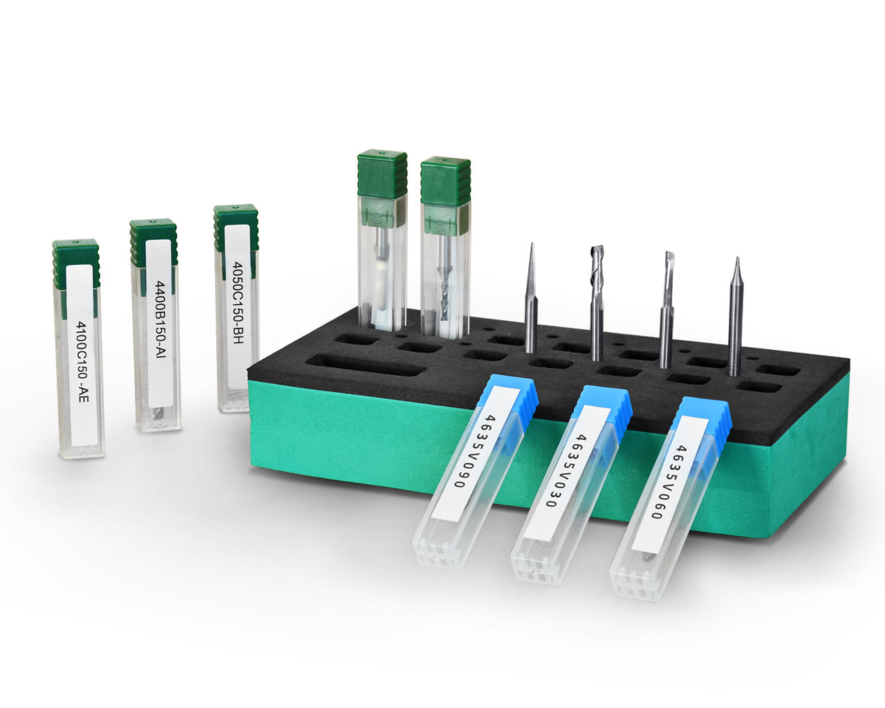 Set of CNC router tool bits stored in a foam holder with labeled protective cases and green-capped tubes, displayed on a white background.