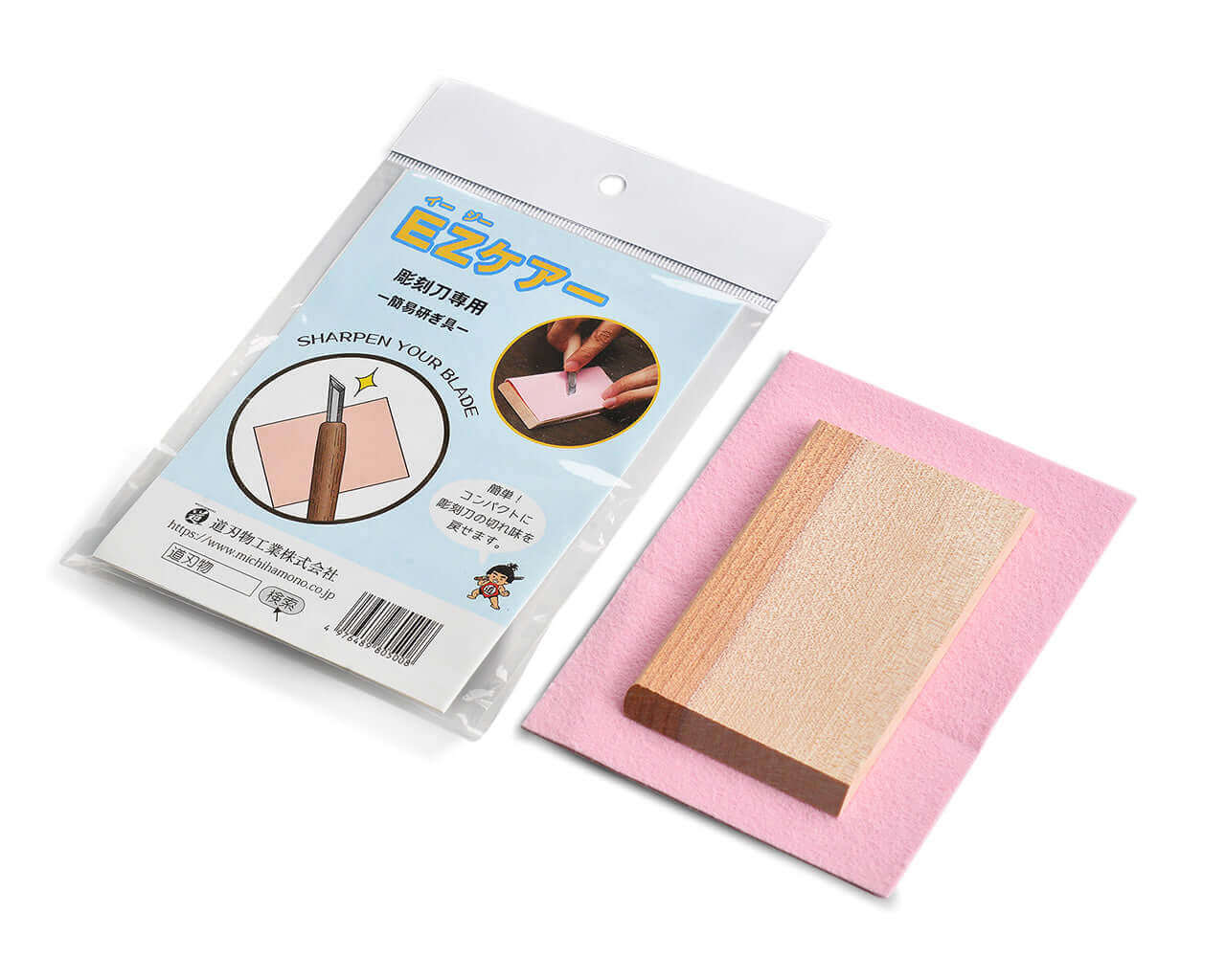 A packaged EZ Care sharpening kit featuring a wooden strop board placed on a pink frosted cloth, designed for blade maintenance and edge polishing.